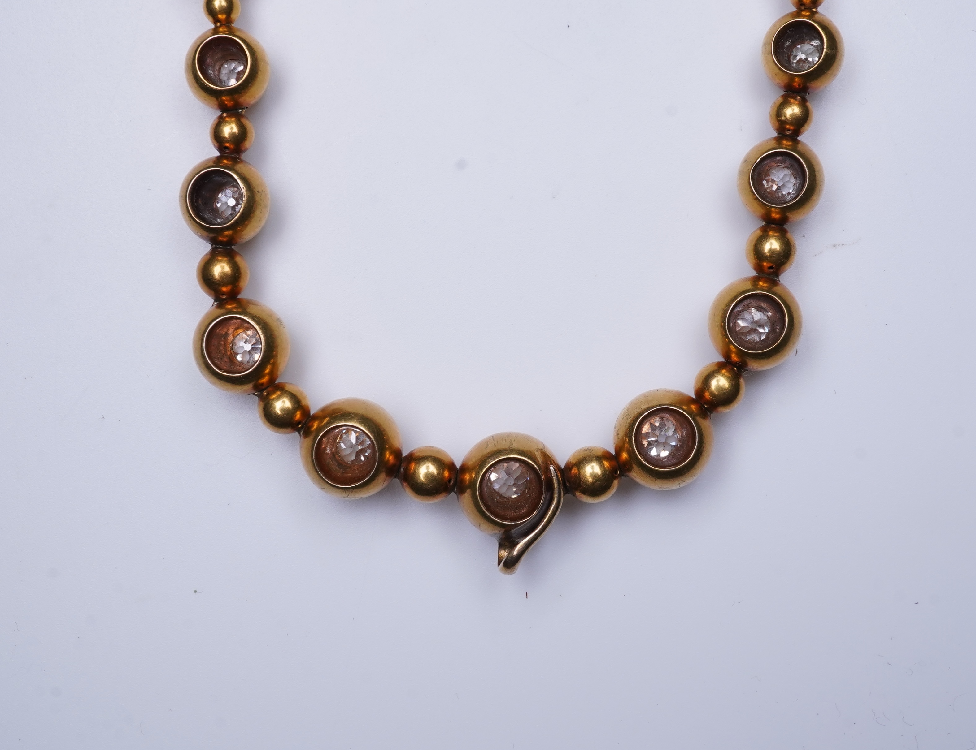 An unusual Victorian gold and diamond necklace, late 19th century